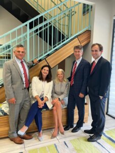 Warshauer Woodward Atkins law partners from left to right are William Atkins, Natalie Woodward, Lyle Griffin Warshauer, Michael Warshauer, and Trent Shuping. 